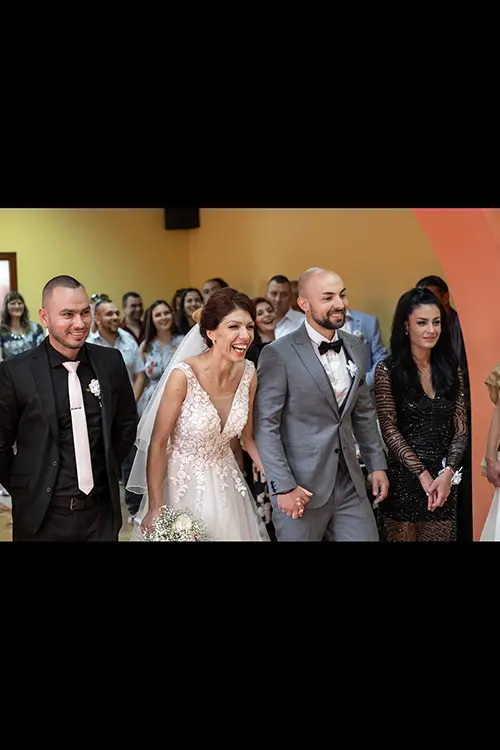 Color wedding photo by Lucas Georgiev. Laugh and happiness between people. Place: Lovech, Bulgaria