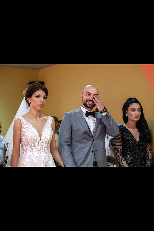 Color wedding photo by Lucas Georgiev. Grooms crying. Place: Lovech, Bulgaria