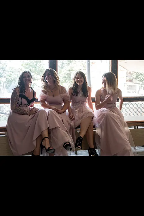 Color wedding photo by Lucas Georgiev. Bridesmaids laughing. Place: Lovech, Bulgaria