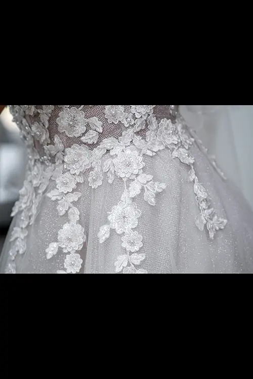 Color wedding photo by Lucas Georgiev. The lace on the wedding dress. Place: Lovech, Bulgaria