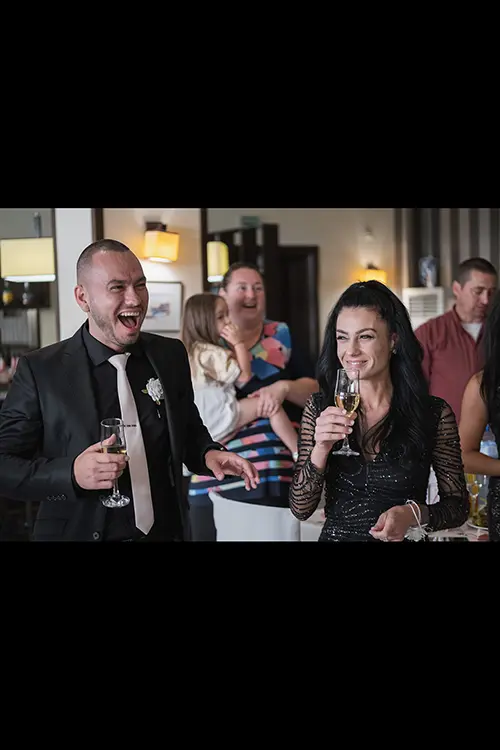 Color wedding photo by Lucas Georgiev. Bestman laughing. Place: Lovech, Bulgaria